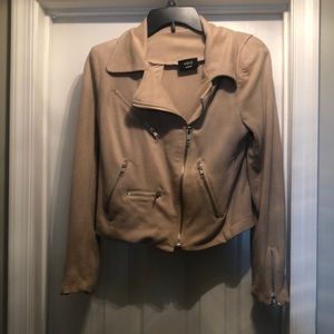 Tan cropped jacket with silver zippers